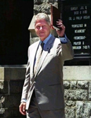 Clinton holding up Bible